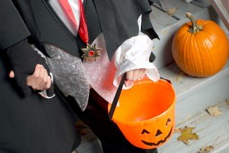 Photo of young child trick-or-treating.