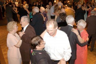Photo of couples on the dance floor at a past WMU Senior Prom.