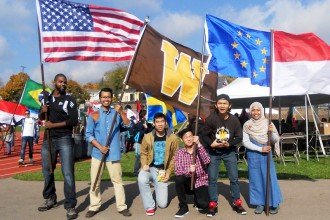 Photo of WMU students participating in the annual parade of flags