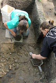 Photo of women working on an excavation at Fort St. Joseph.