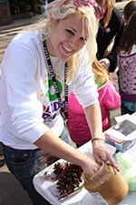 A student helps at an event.