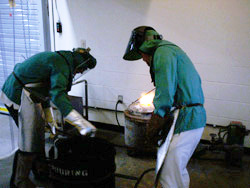 Two students metal casting