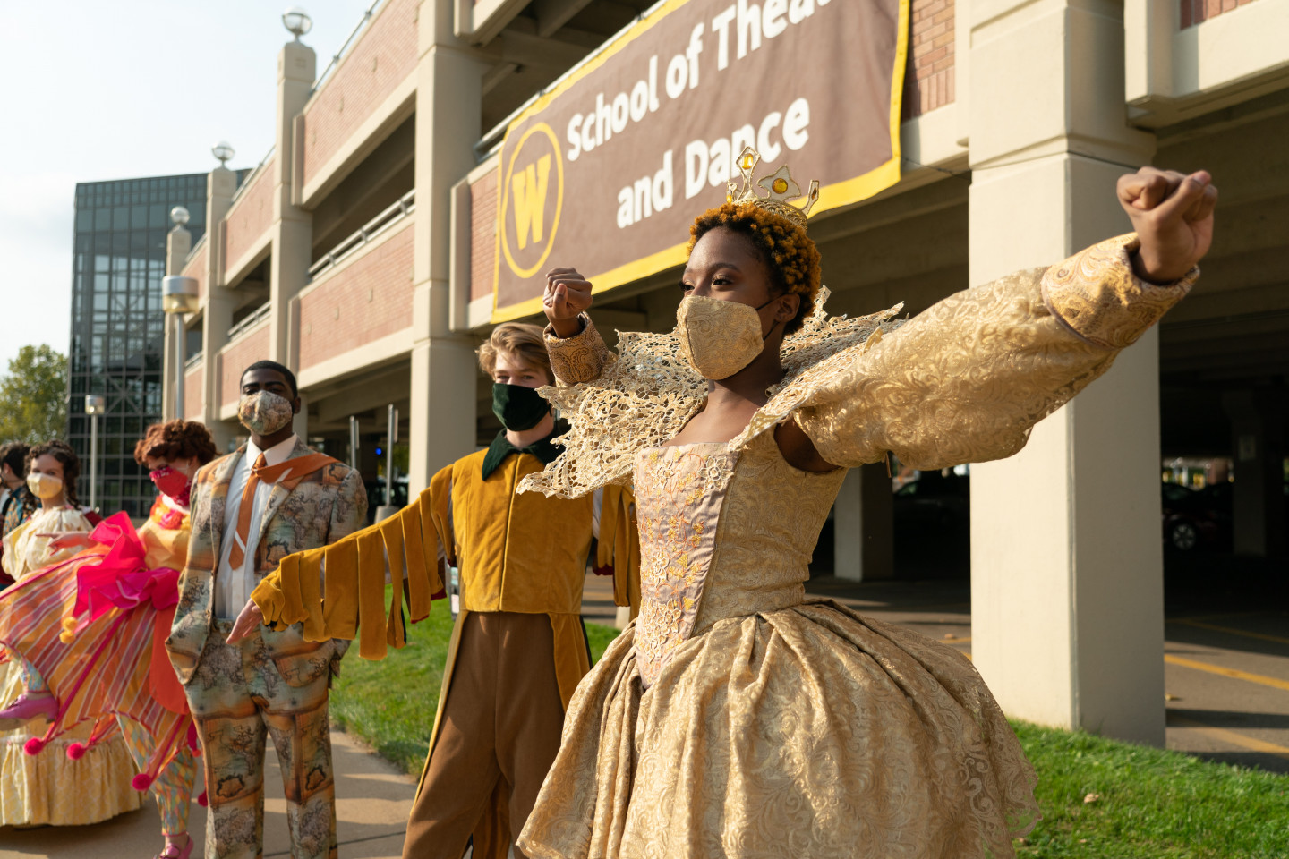 WMU Theatre students in costumes from past shows.