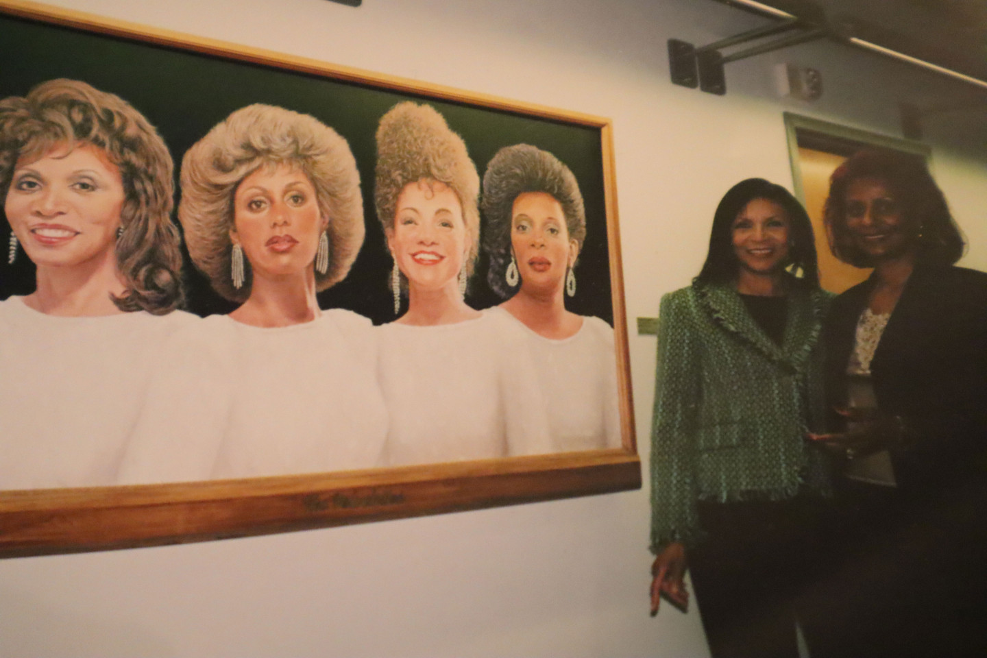 A painting on the wall of The Velvelettes.