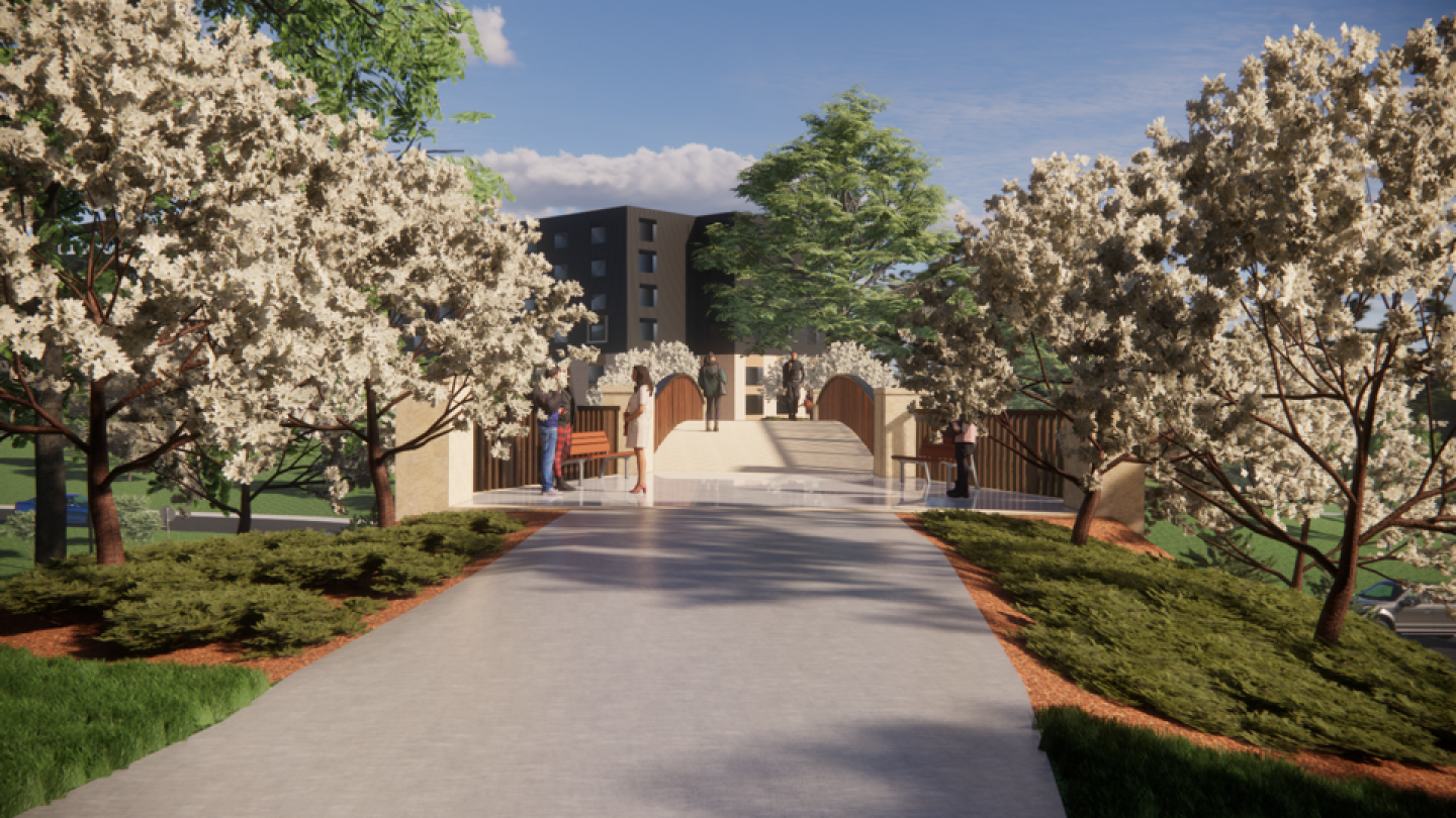 A rendering showing flowering trees and a walkway.