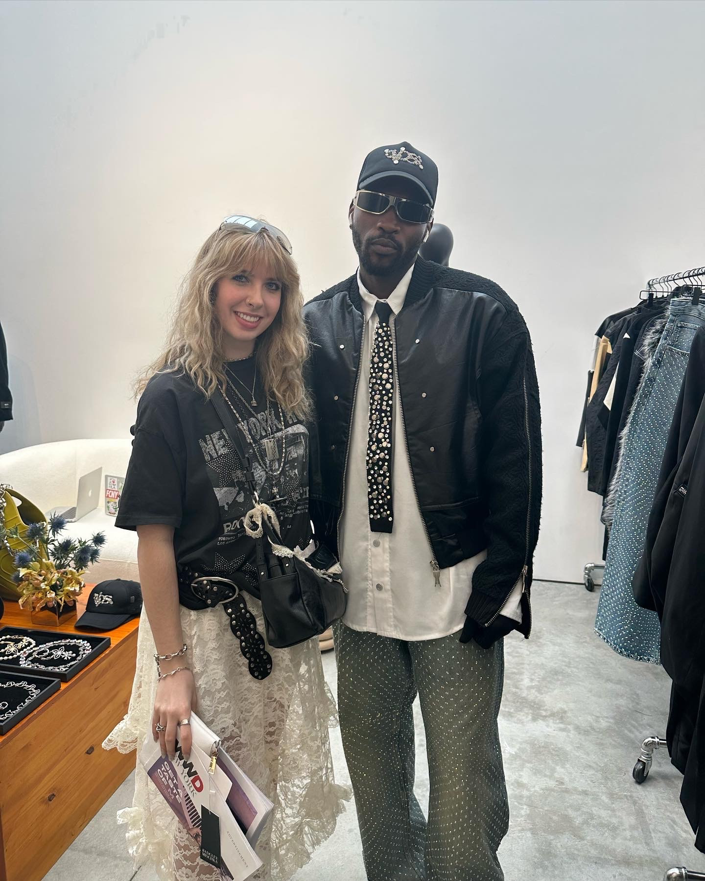 Laura Argentati stands next to designer Muktar Onifade.