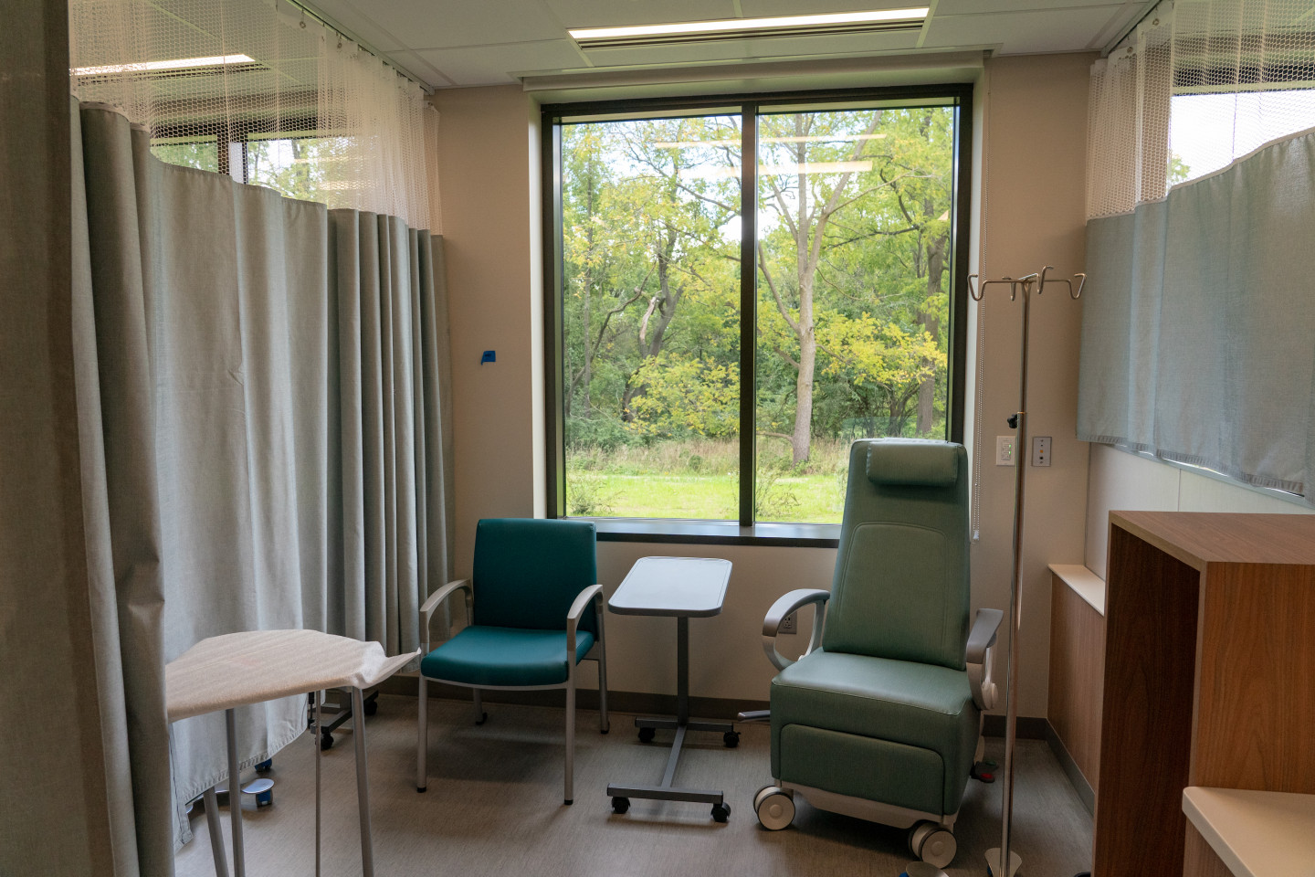 A patient and companion chair inside the Ascension Borgess Cancer Center.