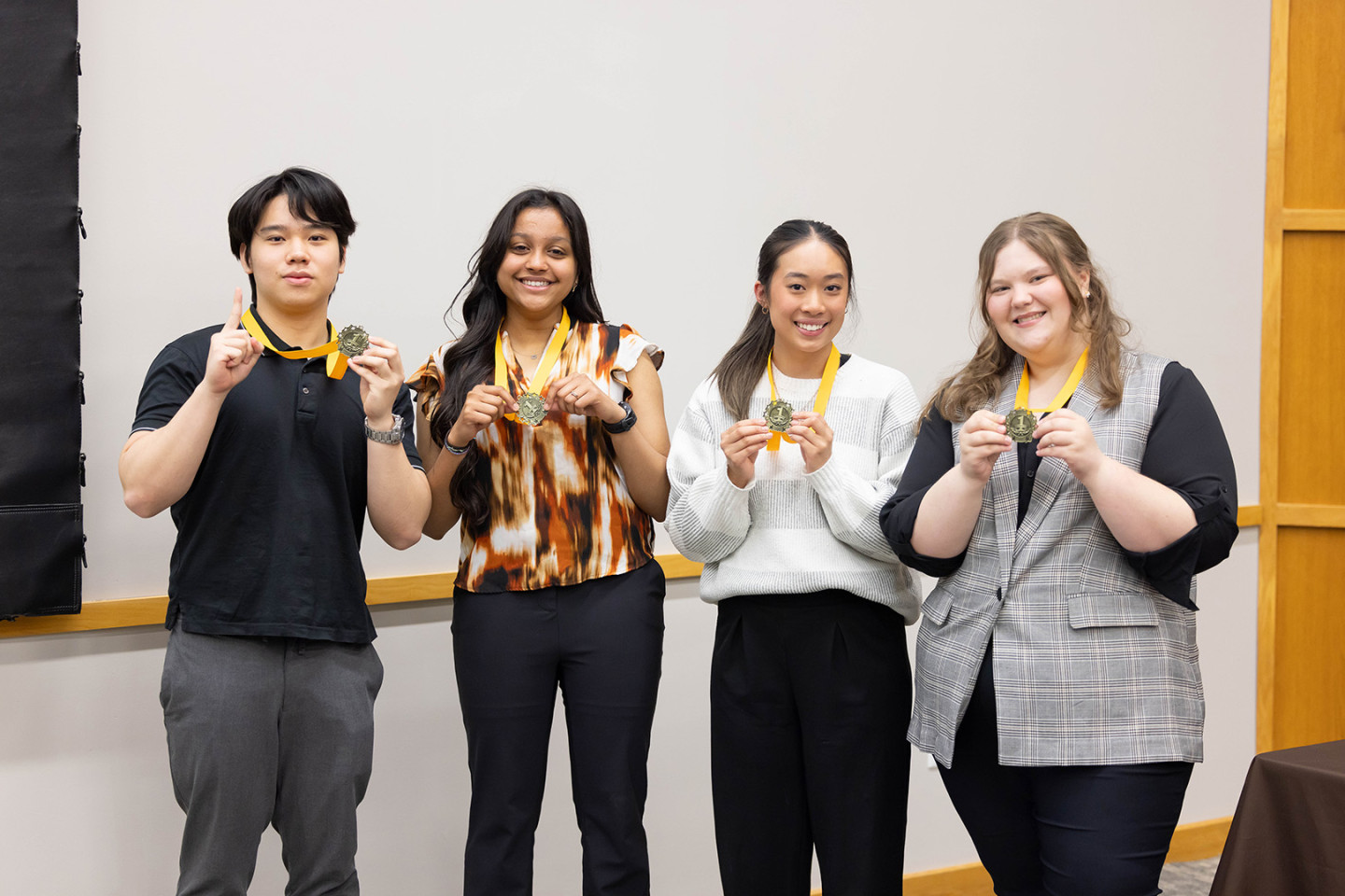 Brush Ease, the winning team at this year's Bronco Pitch Competition. Left to right, team members are Teh Ang Qi, Bhairavi Patel, Sophie Nguyen and Paige DePatis.