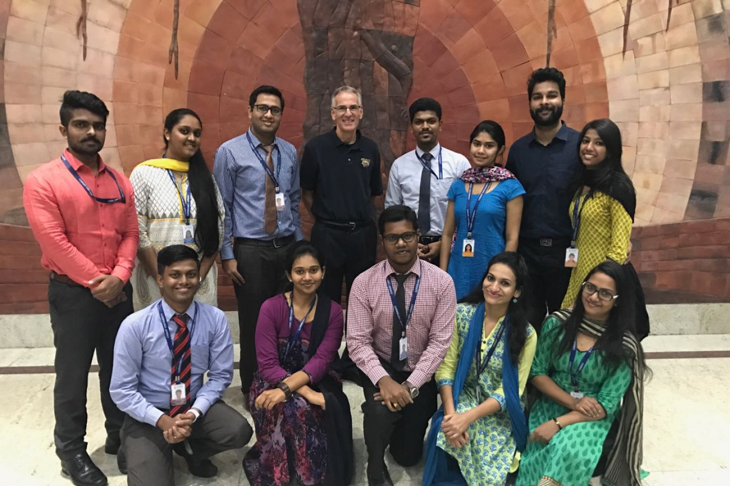Dr. Tim Palmer stands with students on a study abroad trip in India.