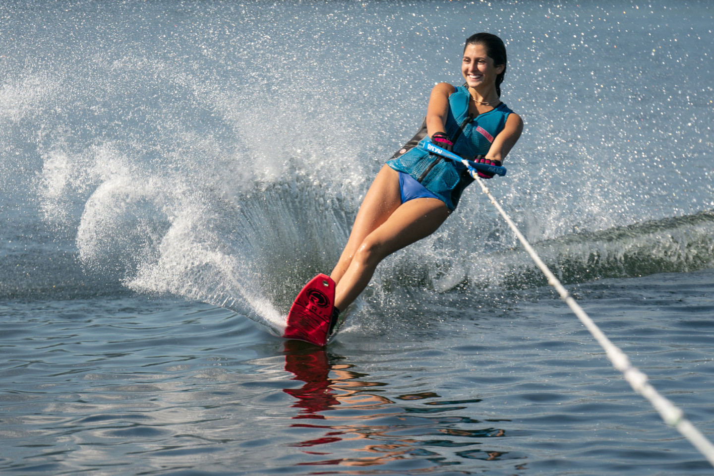 Rachel Evangelista water skis on one ski.