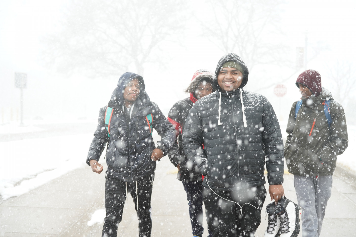 Students walk through the snow on Western's campus.