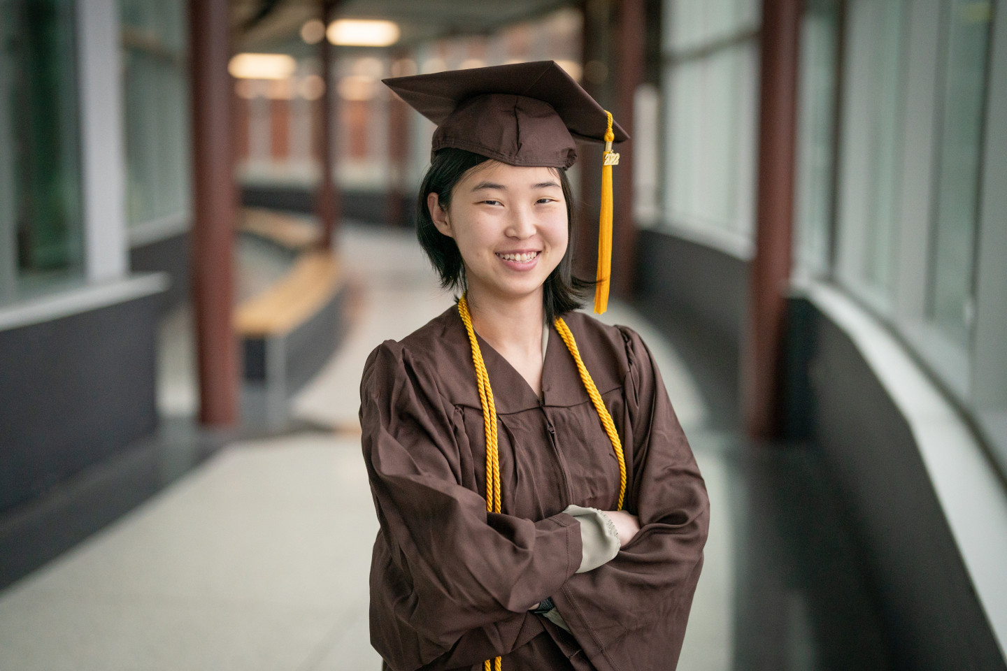 A portrait of Mey Wong in her graduation regalia.