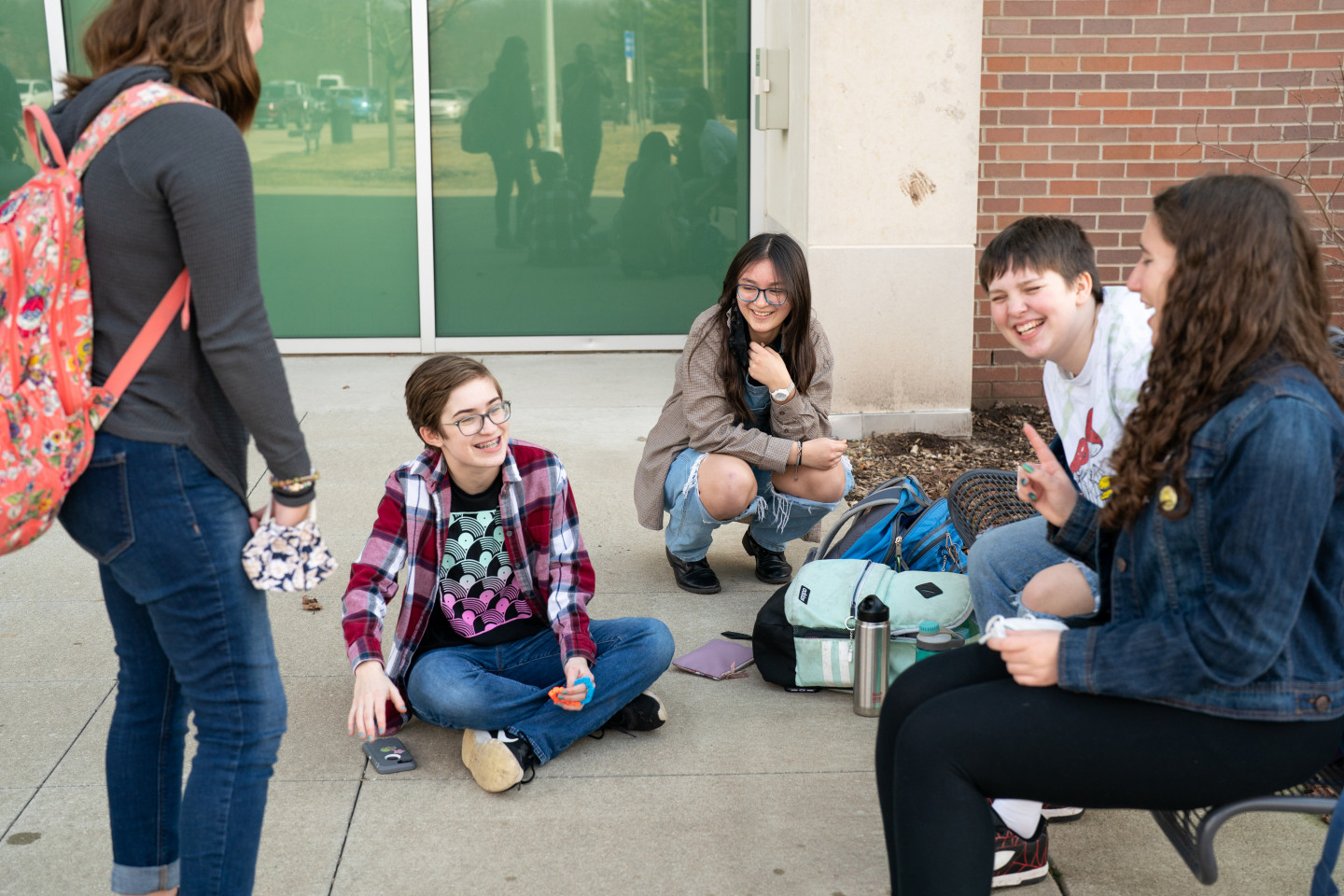 ATYP students sitting outside Sangren Hall.