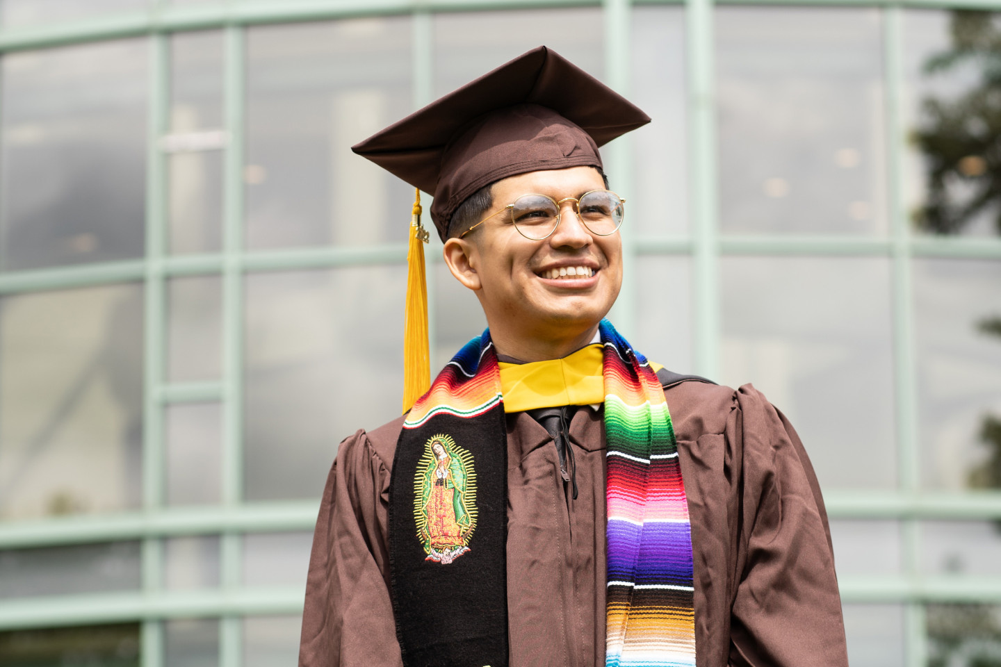 A portrait of Luis Angel Morales in his cap and gown.