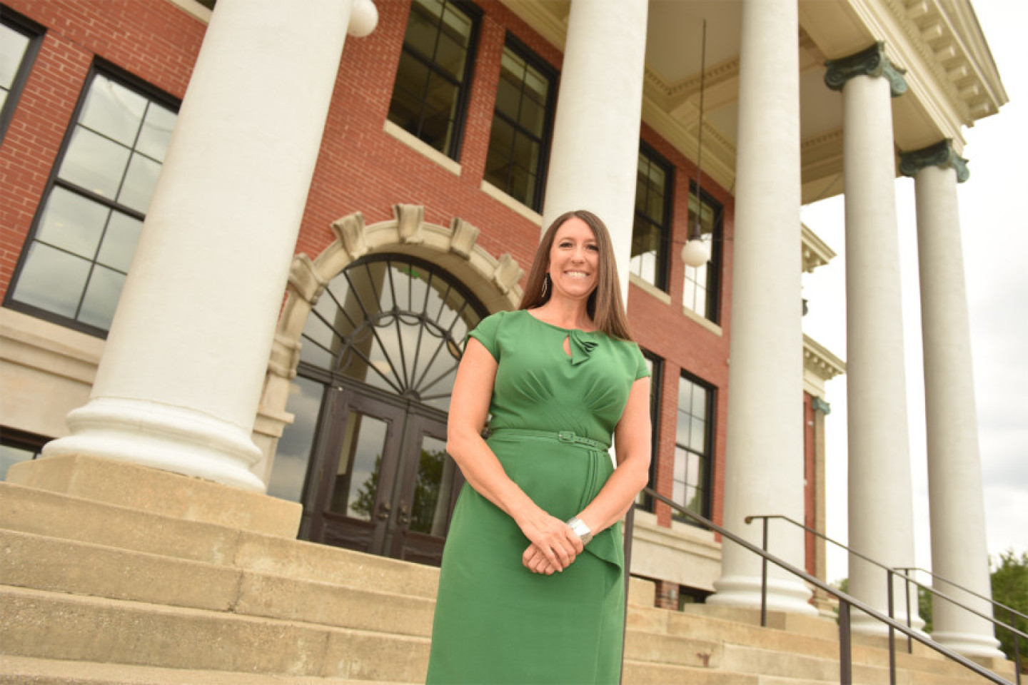 Erica Wehrwein in front of Heritage Hall on Western's campus.