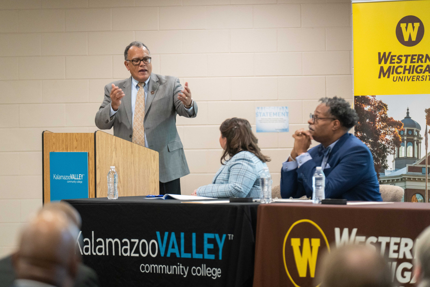 President Montgomery speaking at the podium at Kalamazoo Valley Community College's Texas Township Campus.