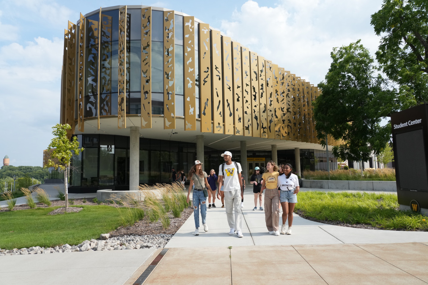 Students walk away from the new WMU Student Center.