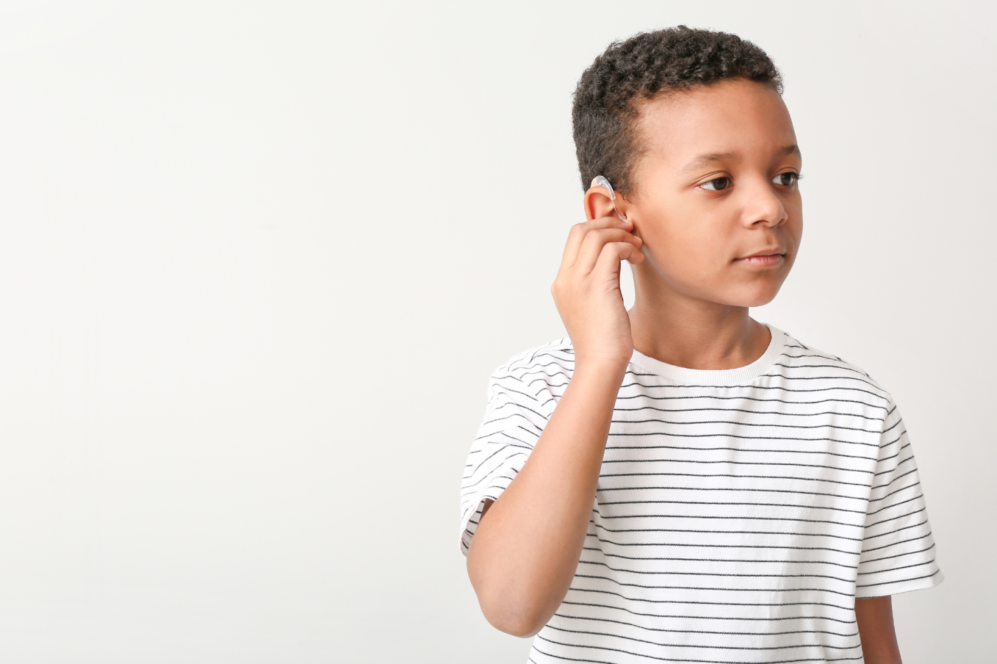 Small child with hearing aid