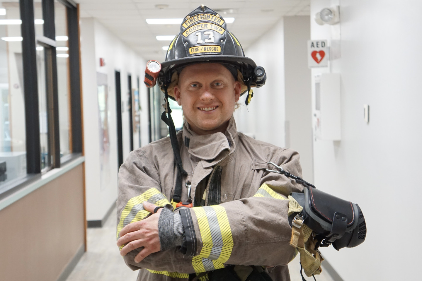 Firefighter in hallway of Sindecuse at WMU