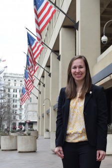 Emily Hawrysz posing in front of the FBI building in Washington, D.C.