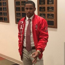JaJuan Kemp poses for a photo in his Kappa Alpha Psi Fraternity jacket. 