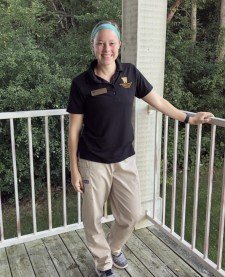 a nursing student standing on a balcony