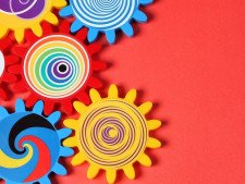 Red background with multi-colored gears on left hand side