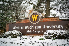 Photo of a Western Michigan University sign in the snow.