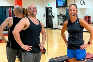 one male and one female group fitness instructor