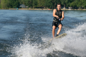 A person being towed on a wakeboard.
