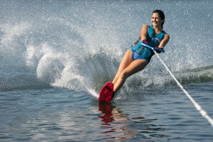 A person water skiing on one ski.