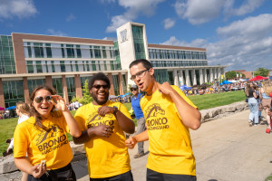 Students pose for a photo in front of Sangren Hall.