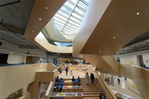 Students sit on the Heart stairs at the center of the WMU Student Center.