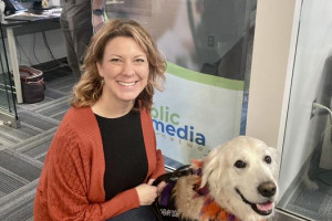 Dr. Angie Moe with Sunny the Therapy Dog