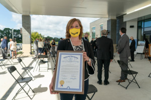 Michigan Rep. Julie Rogers shows the camera the state certificate.
