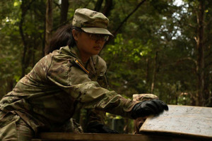 Cadet Lyra Boyce navigating a map