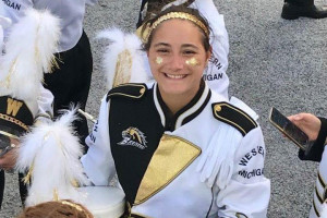Jillian Bright in a Bronco Marching Band uniform.