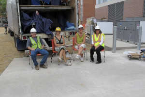Amy Burns and Western staff await the delivery of the newly constructed Sangren Hall furniture.