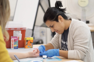 Student testing blood