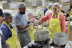 People cooking in kitchen