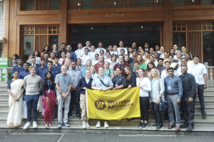 People holding WMU flag