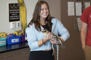 Female student with gator 