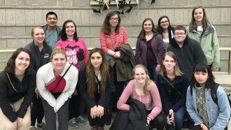 A group of honors students in front of the Charles Wright Museum.