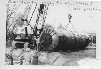 Accelerator ready to be lowered into position.