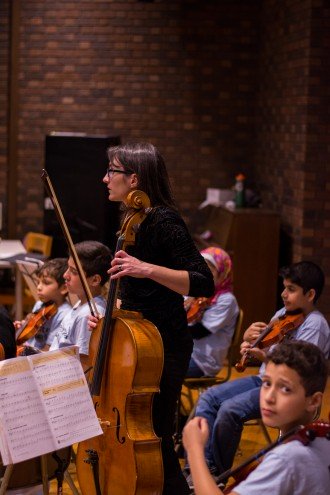 Candid photo of Orchestra Rouh during their performance during 2017 International Education Week at WMU