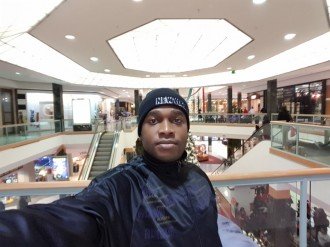 Alain Nzita selfie at the mall