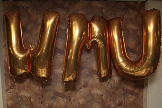 Balloons spelling out WMU