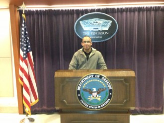 Ali Neamah at Dept. of Defense podium