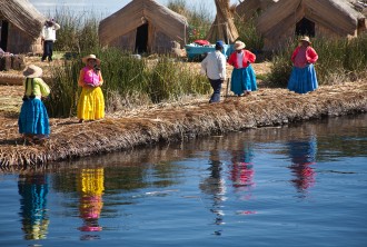 Women in Peru by a stream