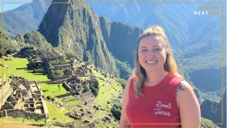 A female student portrait with Machu Picchu historical site in the background.
